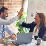 Startup founder finalizing partnership for fixed-fee recruitment strategy